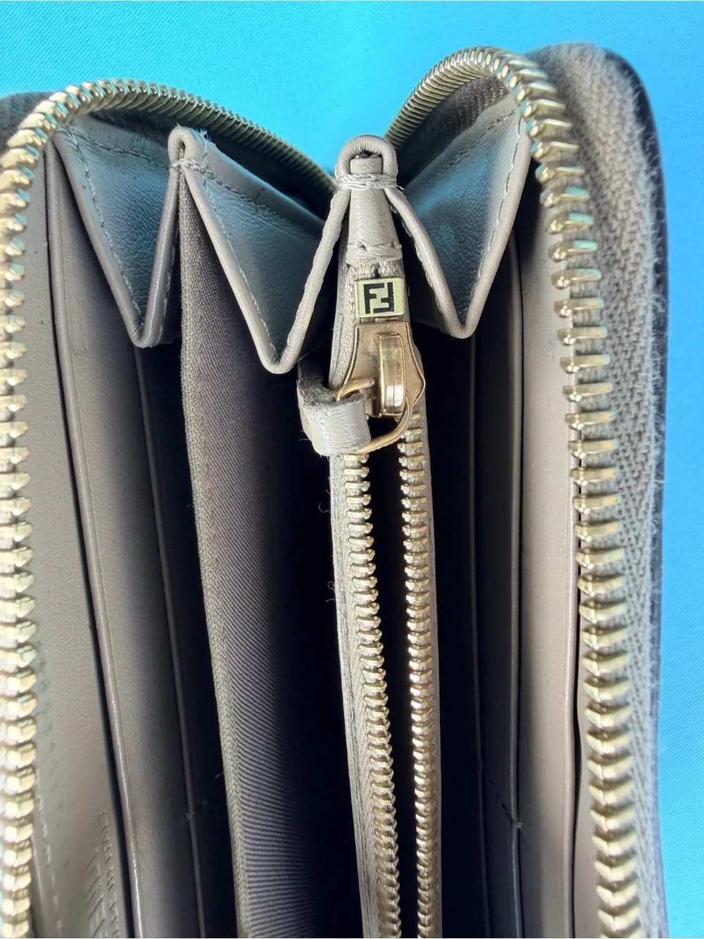 Fendi Zip-Around Wallet in Taupe with Gold Logo. AUTHENTIC